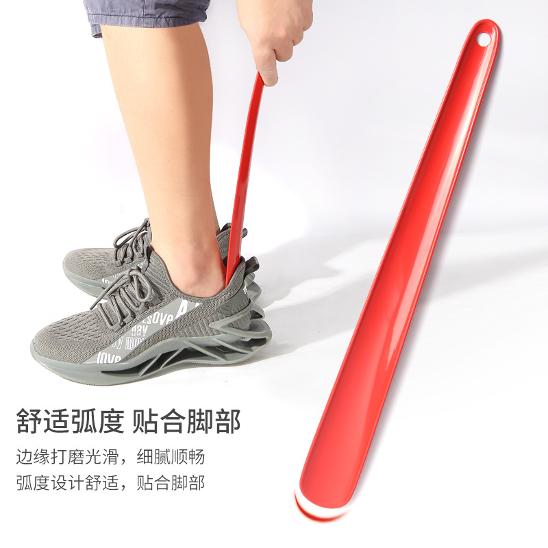 En stock suministro de 40cm de plástico largo zapato extractor zapato bomba hogar largo zapato-usar dispositivo auxiliar imprimible marca zapato-dispositivo de elevación