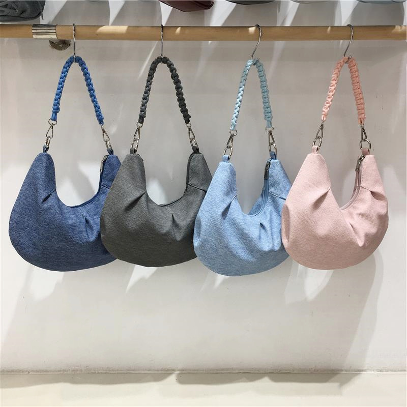 Fashionable retro polyurethane denim handheld purse