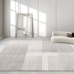現代のシンプルなリビングのじゅうたんのクリームは寂しい風のソファーのお茶のいくつかのマットが冷たい足を隔てて高級な寝室のベッドのサイドのじゅうたんを敷きます。