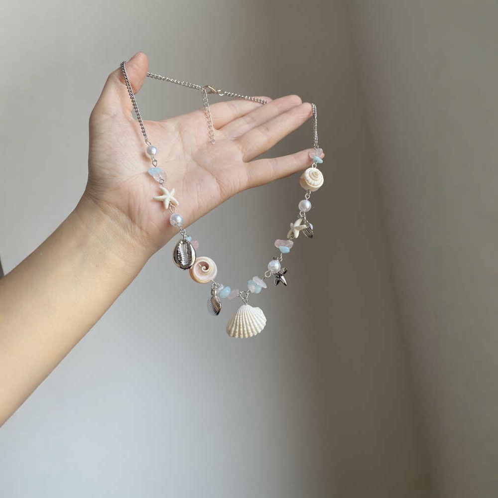 Färgglatt halsband med snäckor sjöstjärnor och pärlor för dam_voghion.com