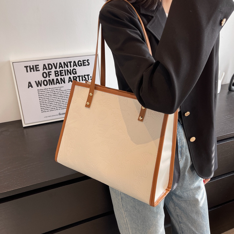 Bolso de mujer 2024 primavera nuevo nicho lienzo de cuatro hojas de gran capacidad bolso de hombro simple bolso de todo tipo