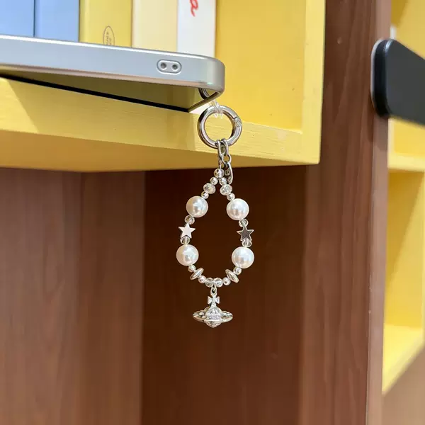 Manufacturer wholesale Korean-style mobile phone chains, alloy three-dimensional Saturn mobile phone lanyards, pearl pentagram simple mobile phone pendants