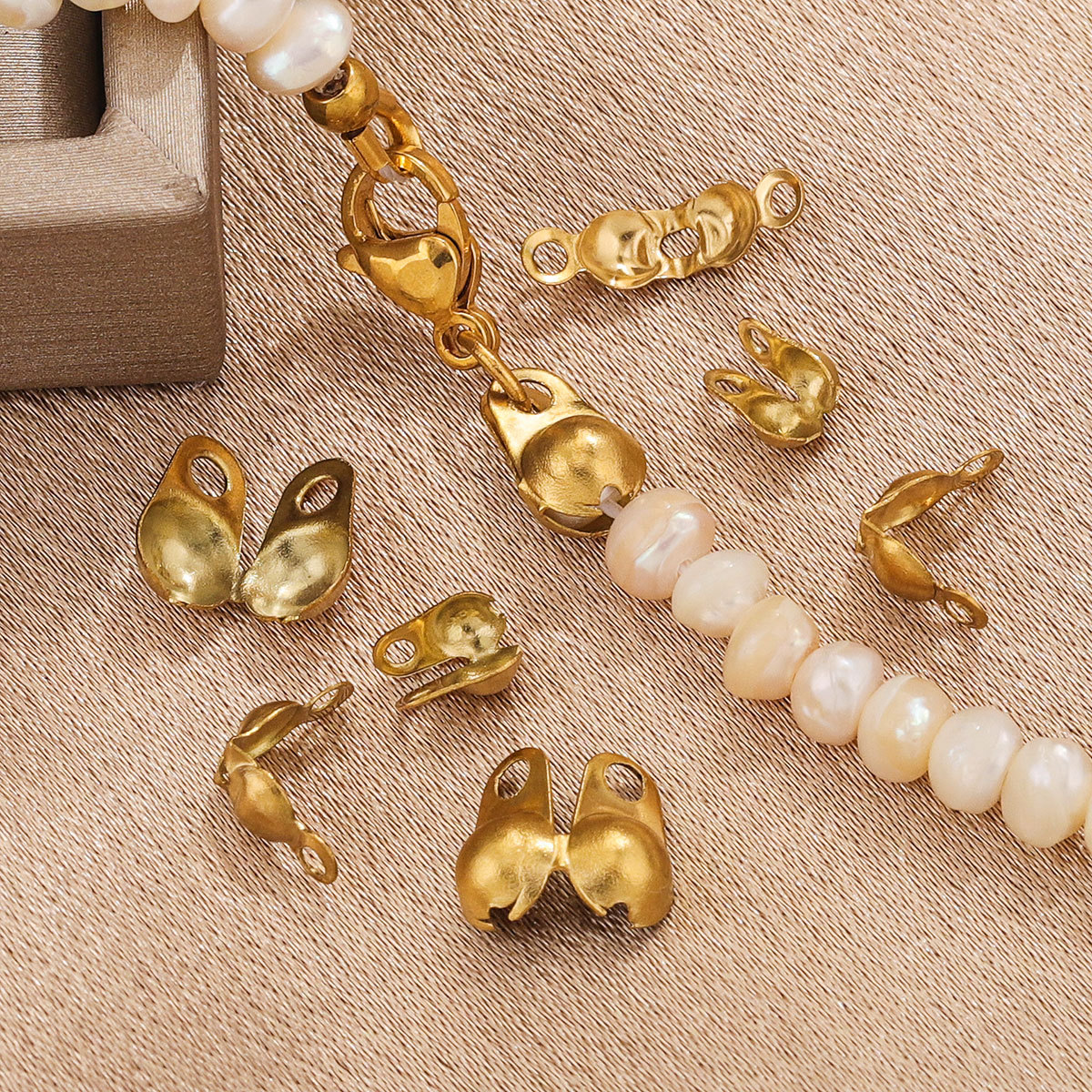 Acero inoxidable con retención de color al vacío, hebilla de cuentas chapada en oro, hebilla de cadena de cuentas de acero de titanio, collar de perlas, hebilla de cuentas de Baotou, joyería de bricolaje