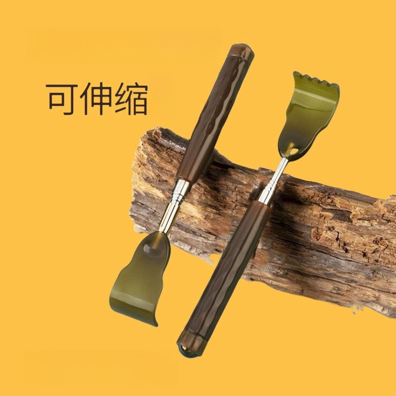 長い柄がむずむずしていて、伸縮性があります。背中の神器をつかんでください。|undefined