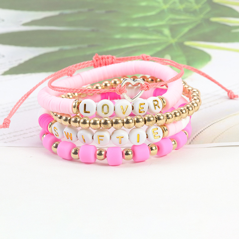 AliExpress caliente suave cerámica traje Pulsera Rosa Suave cerámica cara sonriente pulsera fábrica a largo plazo en stock al por mayor