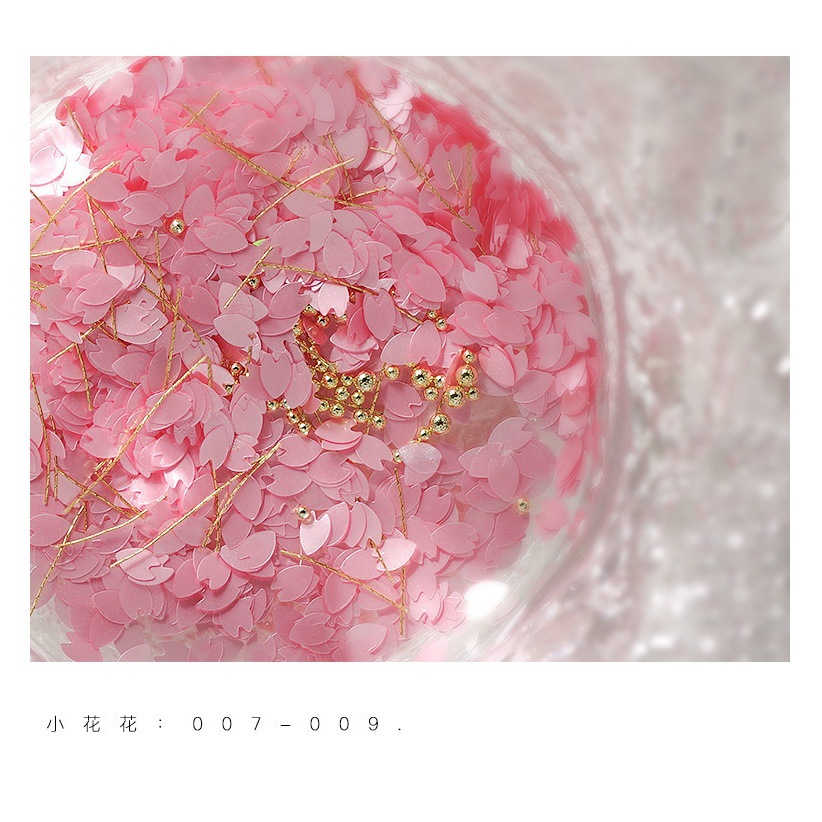 Super Hada pétalo lentejuelas bola de acero hilo de seda material paquete joyería Tiktok red nail art Cerezo flor lentejuelas Aurora