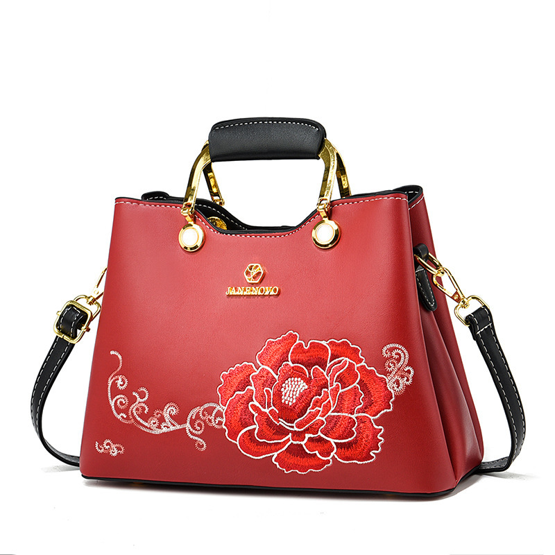 Regalo de temperamento de nicho para mamá 2025 nuevo estilo para suegra y ancianos bolso de hombro bordado elegante y de moda
