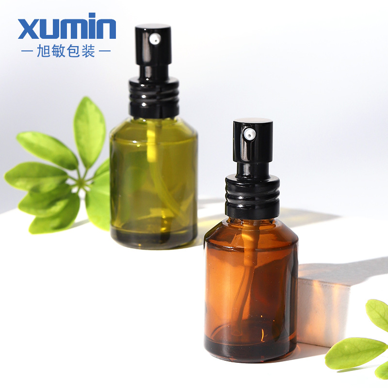 Xumin embalaje 30ml marrón botella de loción de pequeña capacidad botella de líquido de esencia de vidrio verde botella de bomba de presión de sub-embalaje