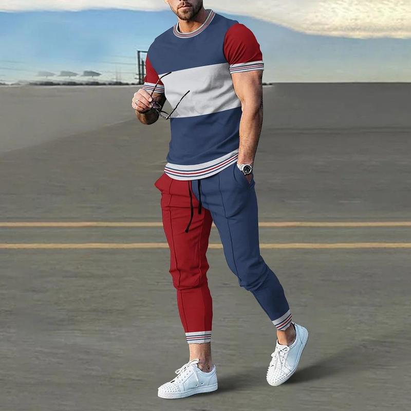 男性のスーツの夏の青年の半袖のtシャツのストライプは色のゆったりした弾力の薄い運動のズボンの2つのセットをつづり合わせます。|undefined