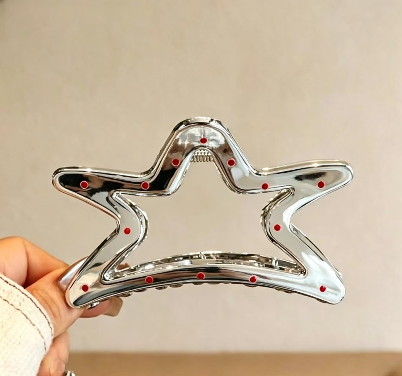 Silver polka dot five-pointed star