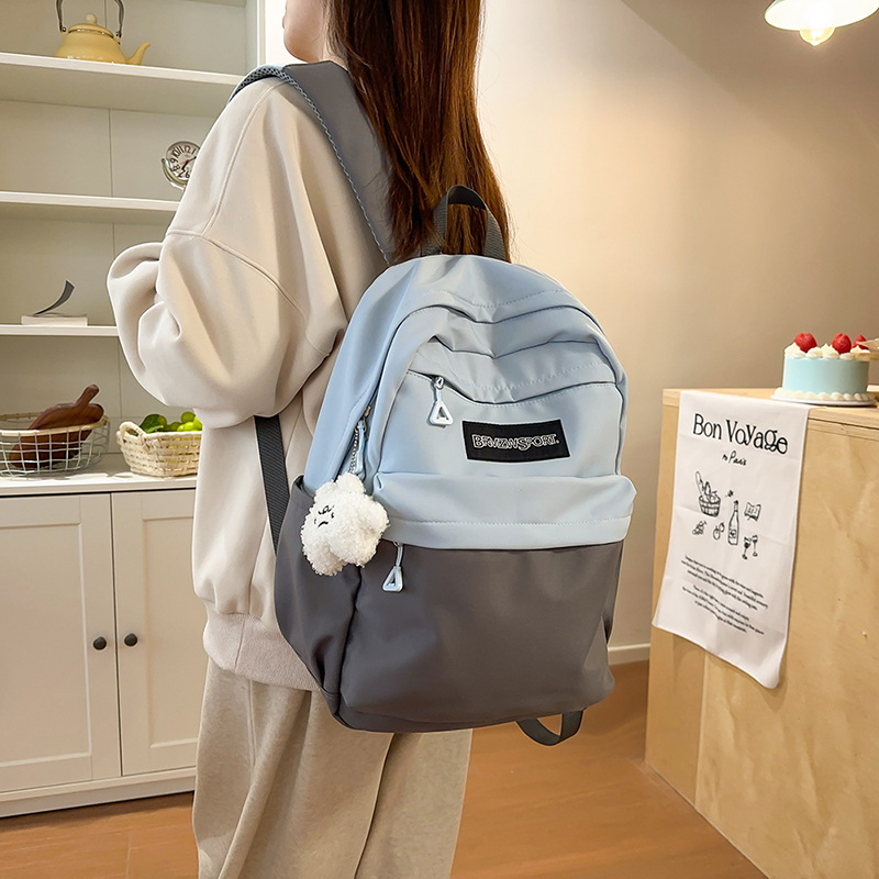 Nuevo paquete de dolor lindo de gran capacidad 2025 empalme de color de moda y viaje de ocio con 100 pares de hombros de alto valor facial inicial