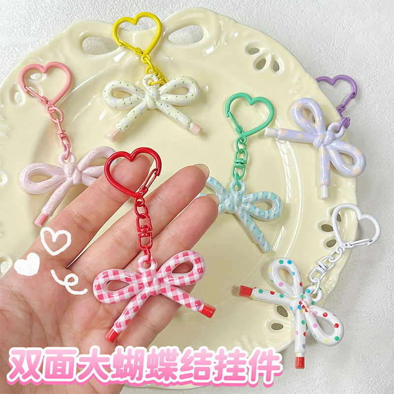 かわいい両面プリント中空弓キーホルダー diy ジュエリーペンダントバッグ携帯電話ペンダントギフトアクセサリー|undefined