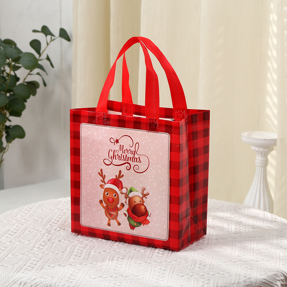 Bolsa de regalo de Navidad transfronteriza bolsa no tejida bolsa de regalo de actividad de Nochebuena lindo regalo de Navidad de dibujos animados