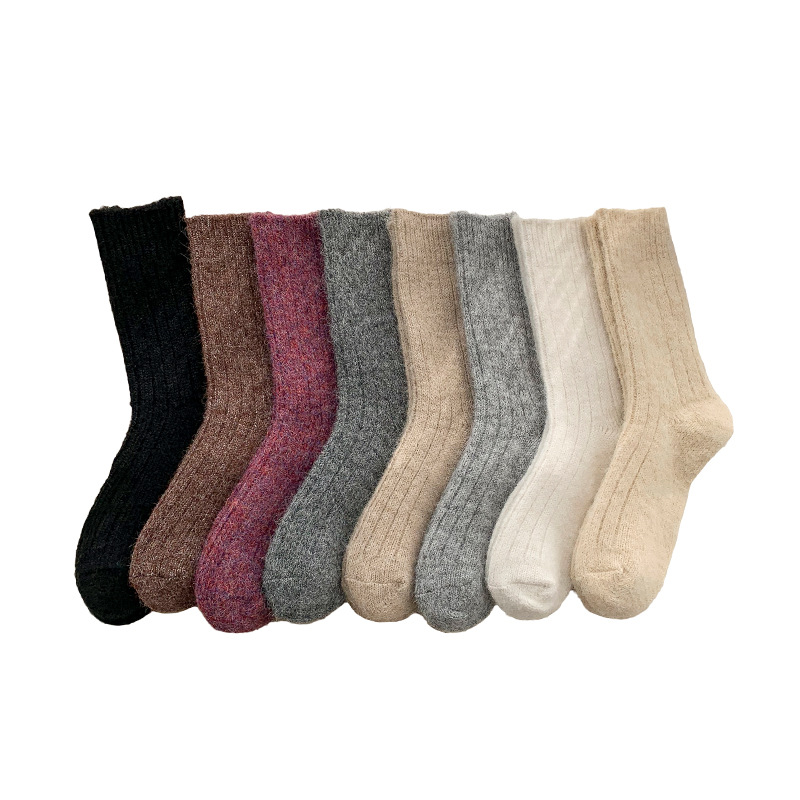Calcetines para mujeres de otoño y invierno gruesas de lana de oveja de color sólido coreano de agujas gruesas calientes de estilo universitario calcetines de pila en casa