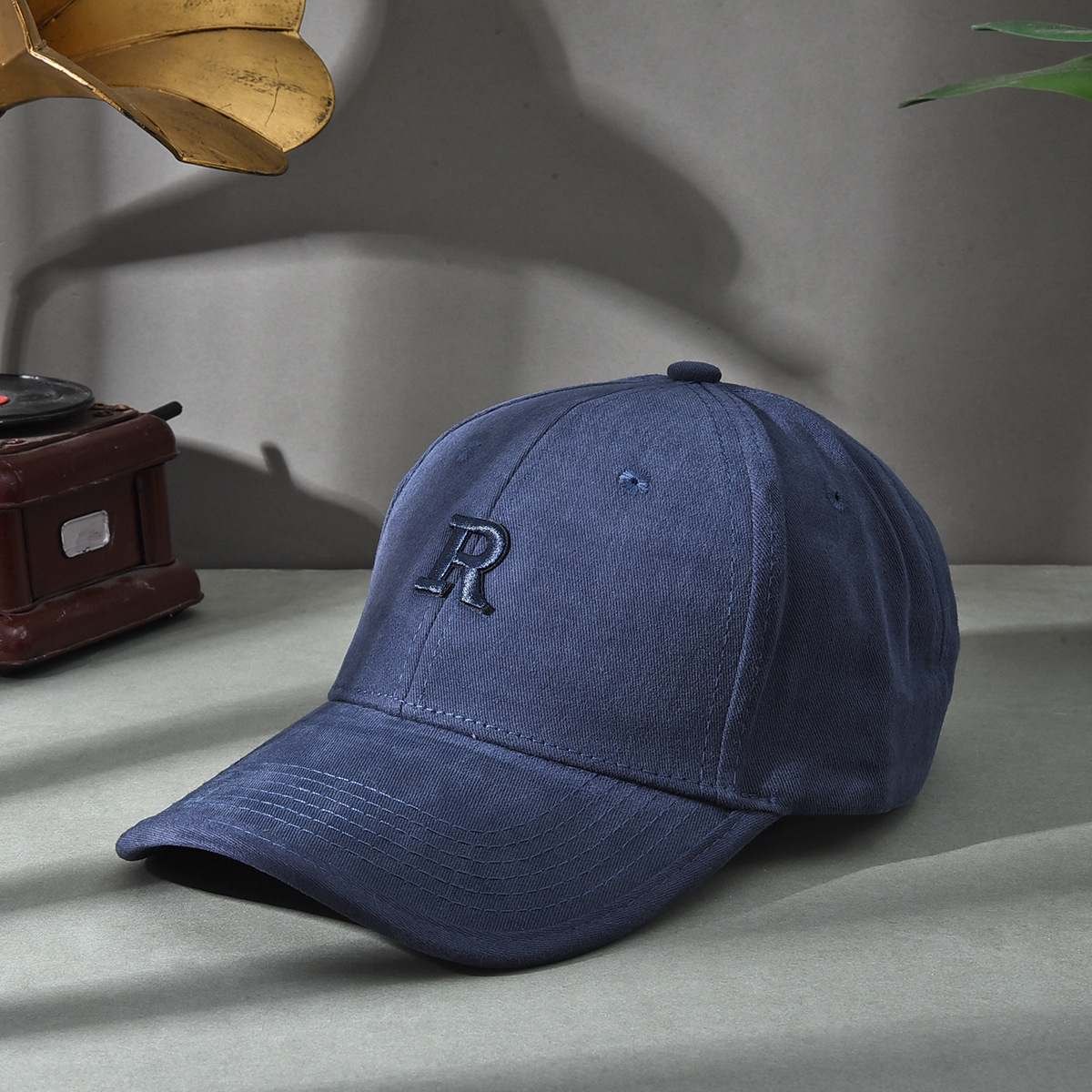 Versión de elevación R sombrero de estilo coreano sombrero de béisbol molido sombrero de béisbol de otoño y invierno sombrero de boca de pato cara pequeña