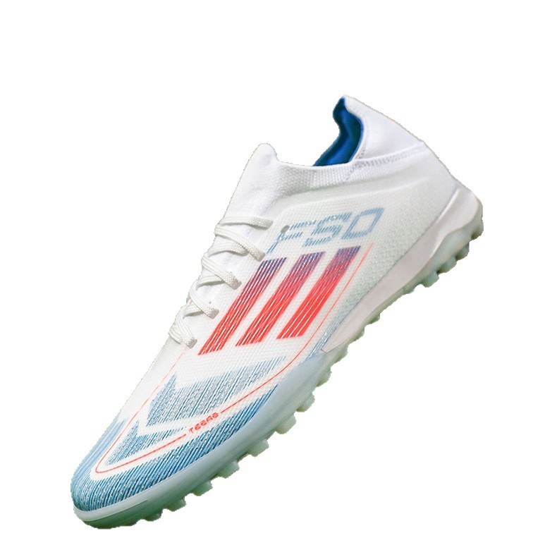 Fábrica al por mayor nuevo F50 baja zapatos de fútbol juveniles clavos de hierba zapatos de fútbol de competencia profesional