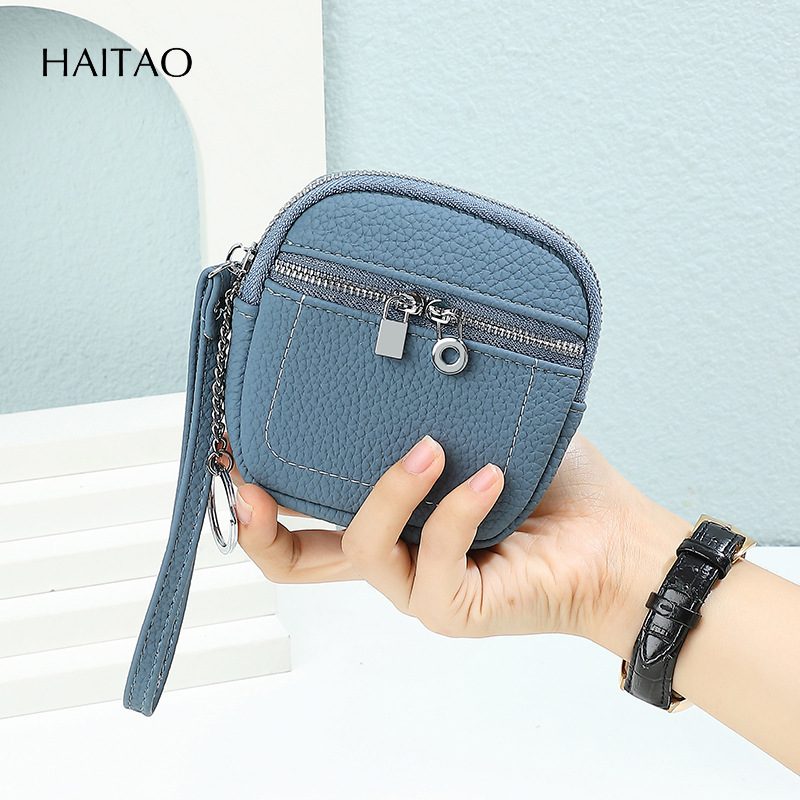 Nuevo lindo bolso de cambio de mano multifuncional simple sensación de alto nivel de doble cremallera lápiz labial bolso de tarjeta pequeña cartera