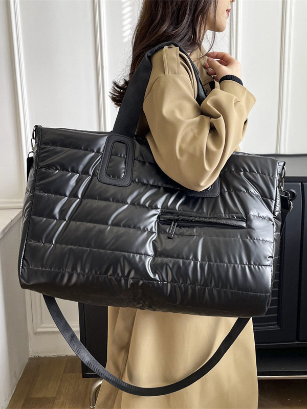 Otoño e invierno nuevo estilo de ropa de algodón de nicho bolso de mensajero de moda moderna para hombres y mujeres bolso de mensajero portátil de gran capacidad