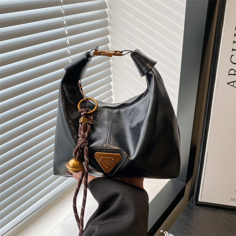 2025 nueva sensación de retro bolsos de mujer moda moda textura bolsos de hombro coreanos populares mochila de viaje