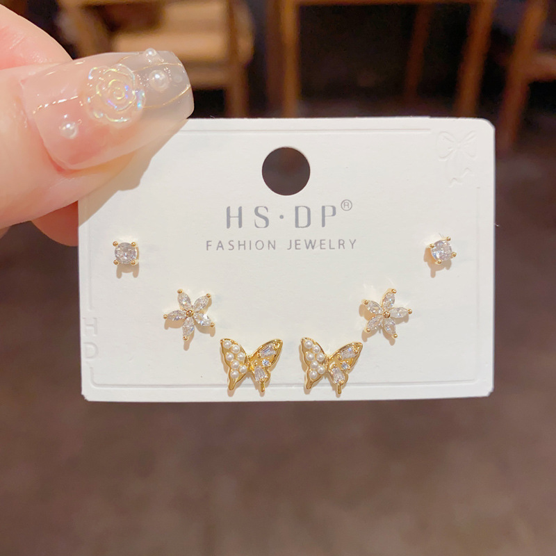 S925 aguja de plata micro incrustaciones de circón pendientes cortos pendientes de pelo corto japonés y coreano elegante todo-fósforo simple conjunto de tres piezas pendientes para las mujeres