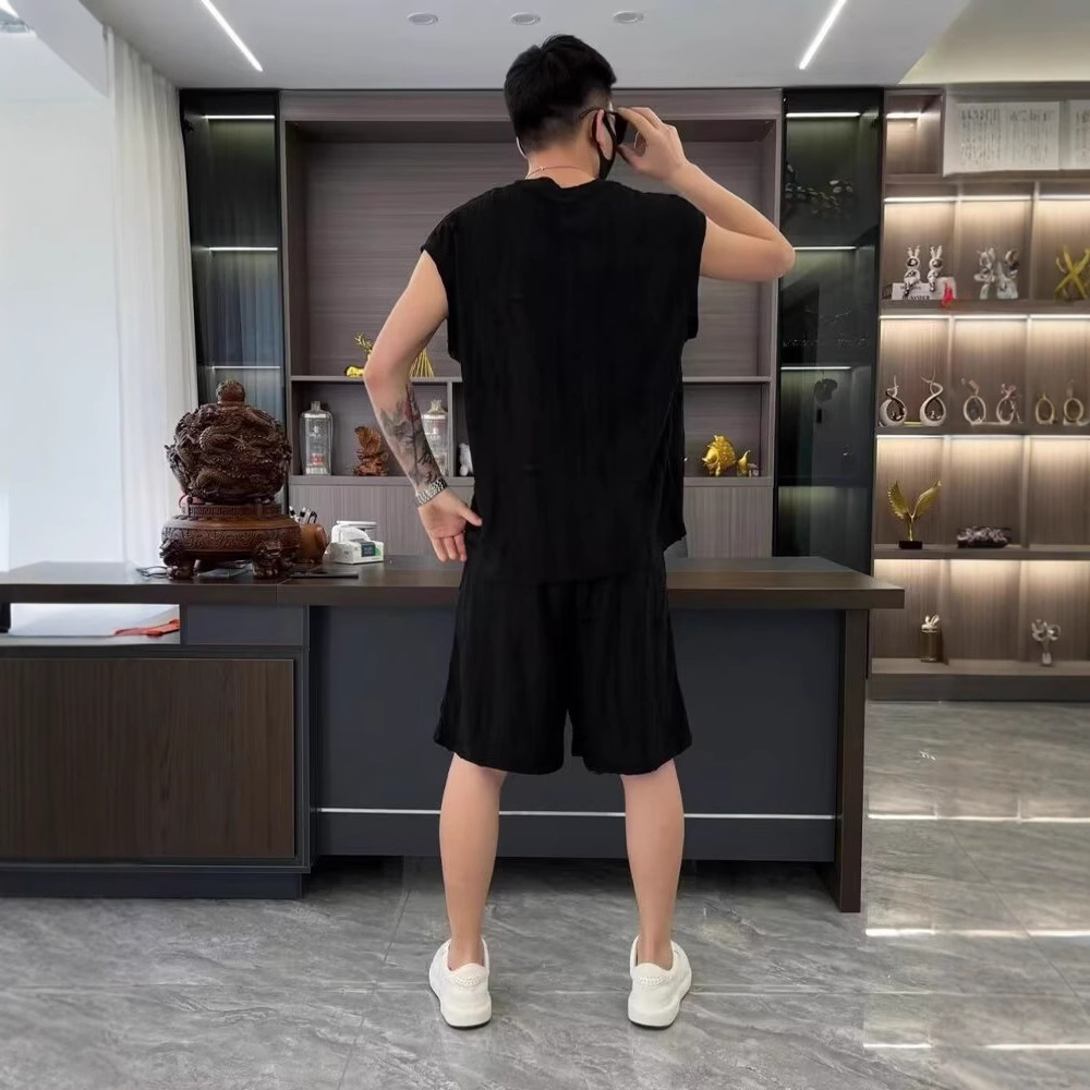 Verano nuevo estilo de hombre estilo de Hong Kong hueco agujero conjunto casual marca de moda chaleco de hombro corto conjunto de dos piezas