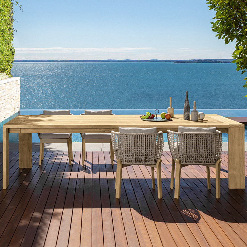 Villa balcón jardín al aire libre mesa de caña sillas patio terraza resort impermeable anti-solar anticorrosión mesa larga de teca