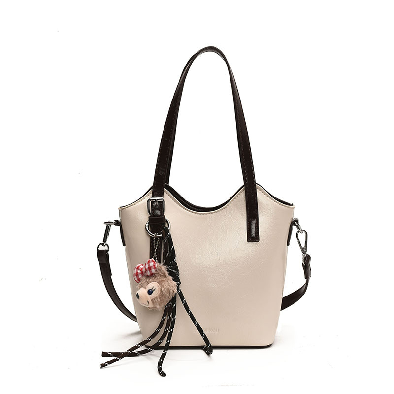 Este año, la moda retro popular bolsas de mano de primavera 2025, nuevas bolsas de hombro de gran capacidad para viajar al trabajo.