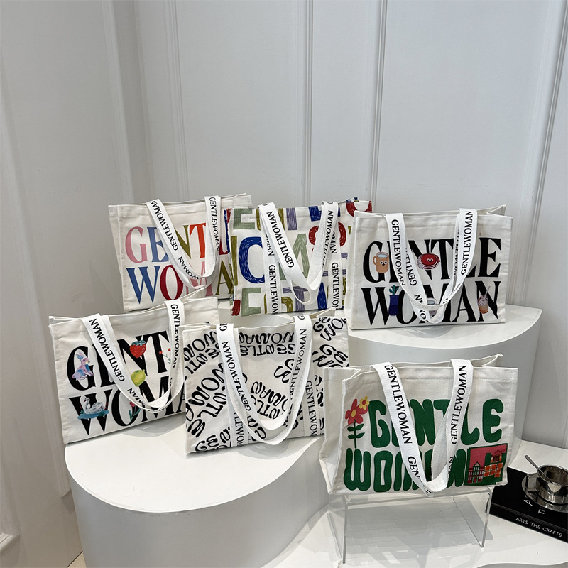 Personalidad simple impresión de letras bolsos de lona portátiles 2024 nuevo invierno literatura tote bolsos de hombro de moda