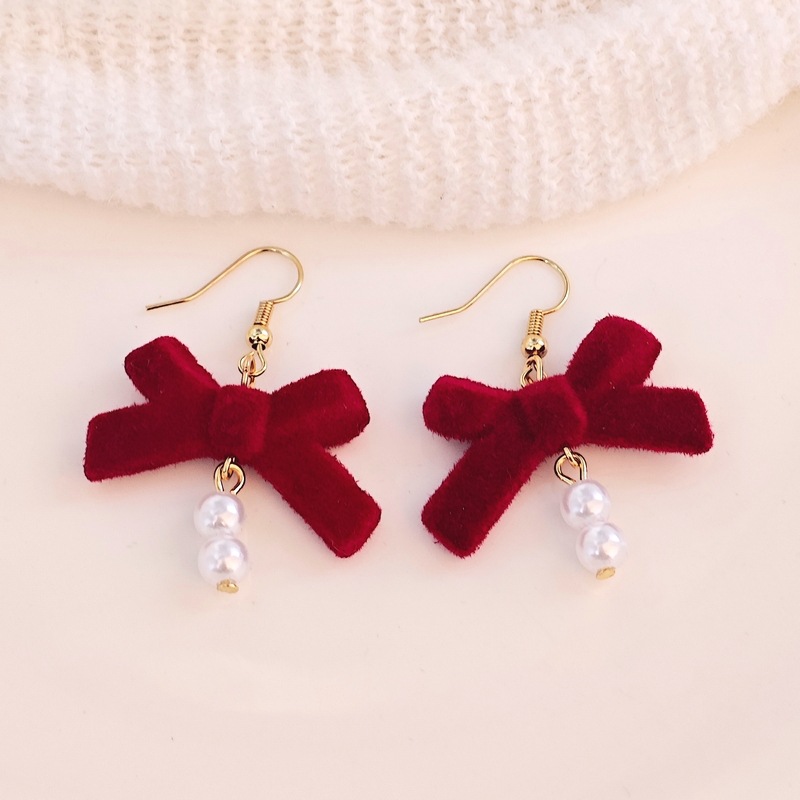 @Oferta especial @ Joyería elegante pendientes simples con lazo de perlas pendientes de moda versátiles de alta gama para mujer pendientes al por mayor