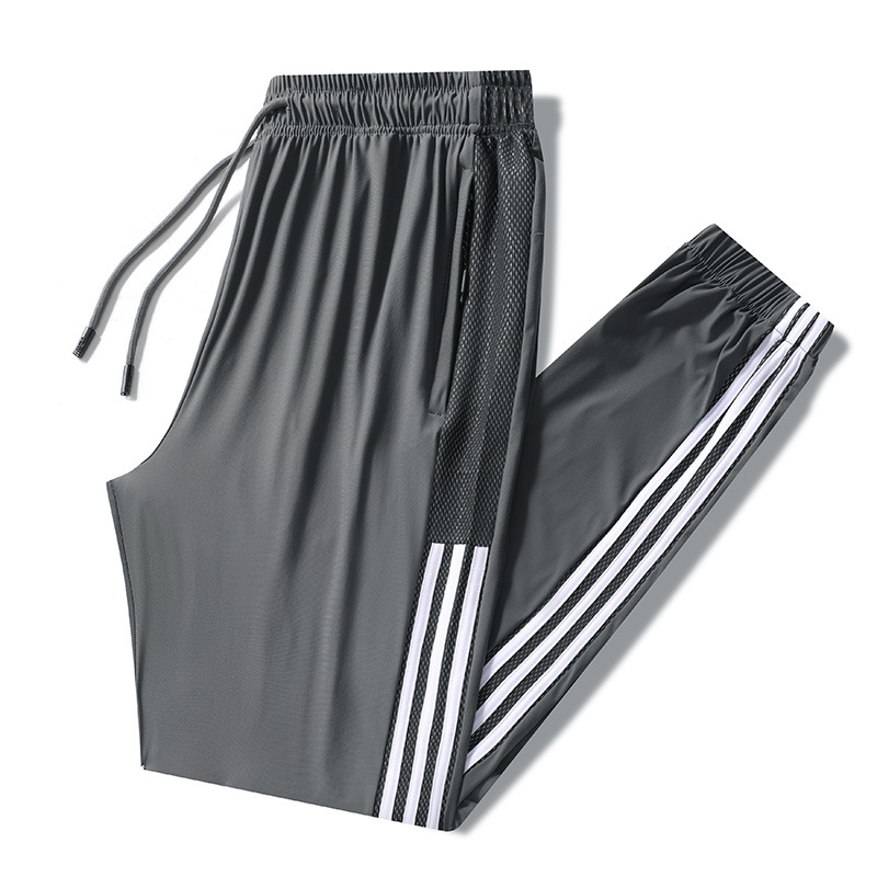 Pantalones de secado rápido de talla grande 2022 pantalones de tres barras de seda de hielo de verano estilo casual suelto de fábrica al por mayor
