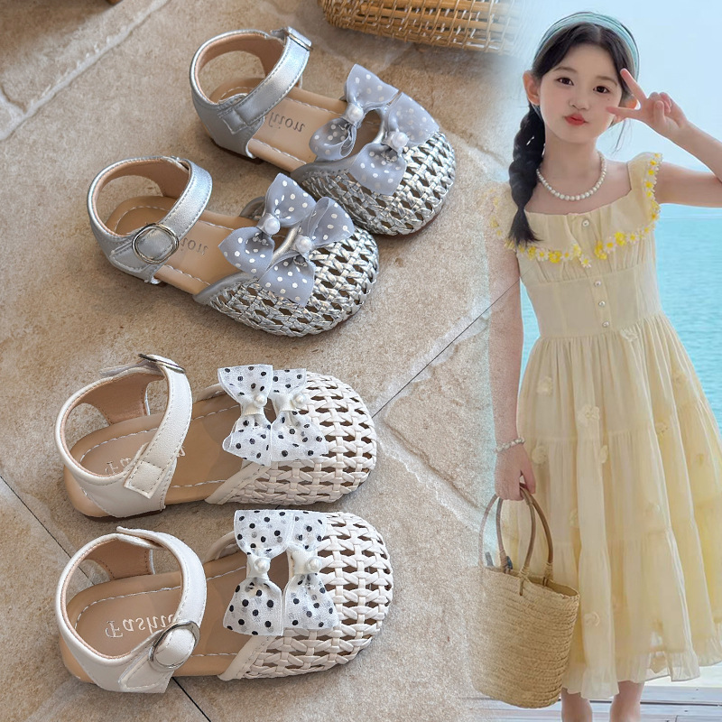 Niñas sandalias trenzadas 2026 verano nuevo bebé arco sandalias huecas zapatos princesa para niños