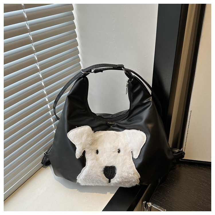 The new autumn and winter 2024 fashion cartoon backpack with simple, individual and niche design, single-shoulder bag and commuter tote bag undefined