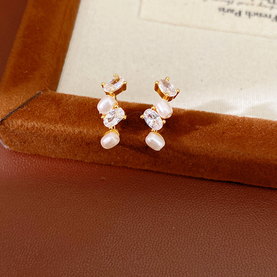 Agujas de plata de diamante oval perla