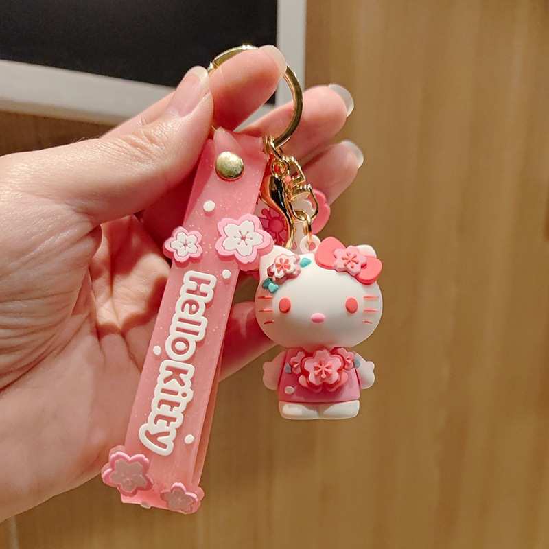 Perro de orejas grandes Melody KT gato pudín perro Kolomi caricatura de silicona llavero colgante bolsa colgante caja ciega regalo