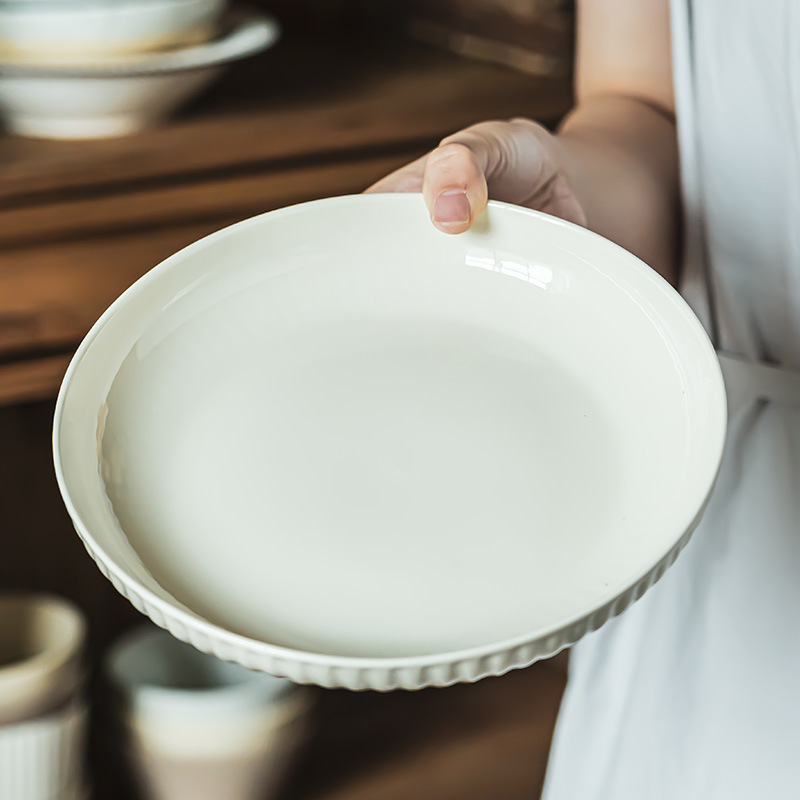 Plato en relieve lleno de sentido del diseño, plato de postre de estilo retro, plato de carne occidental sencillo para el hogar, plato de arroz, vajilla