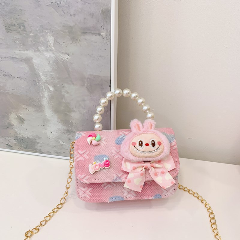 Bagos para niños 2025 nuevo estilo coreano de niña princesa bolso de cambio de mano lindo bolso de hombro de dibujos animados de peluche