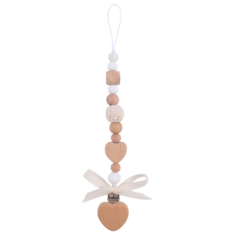 Nuevo bebé de dibujos animados hechos a mano arco chupete cadena creativa DIY bebé silicona teether pulsera juguete