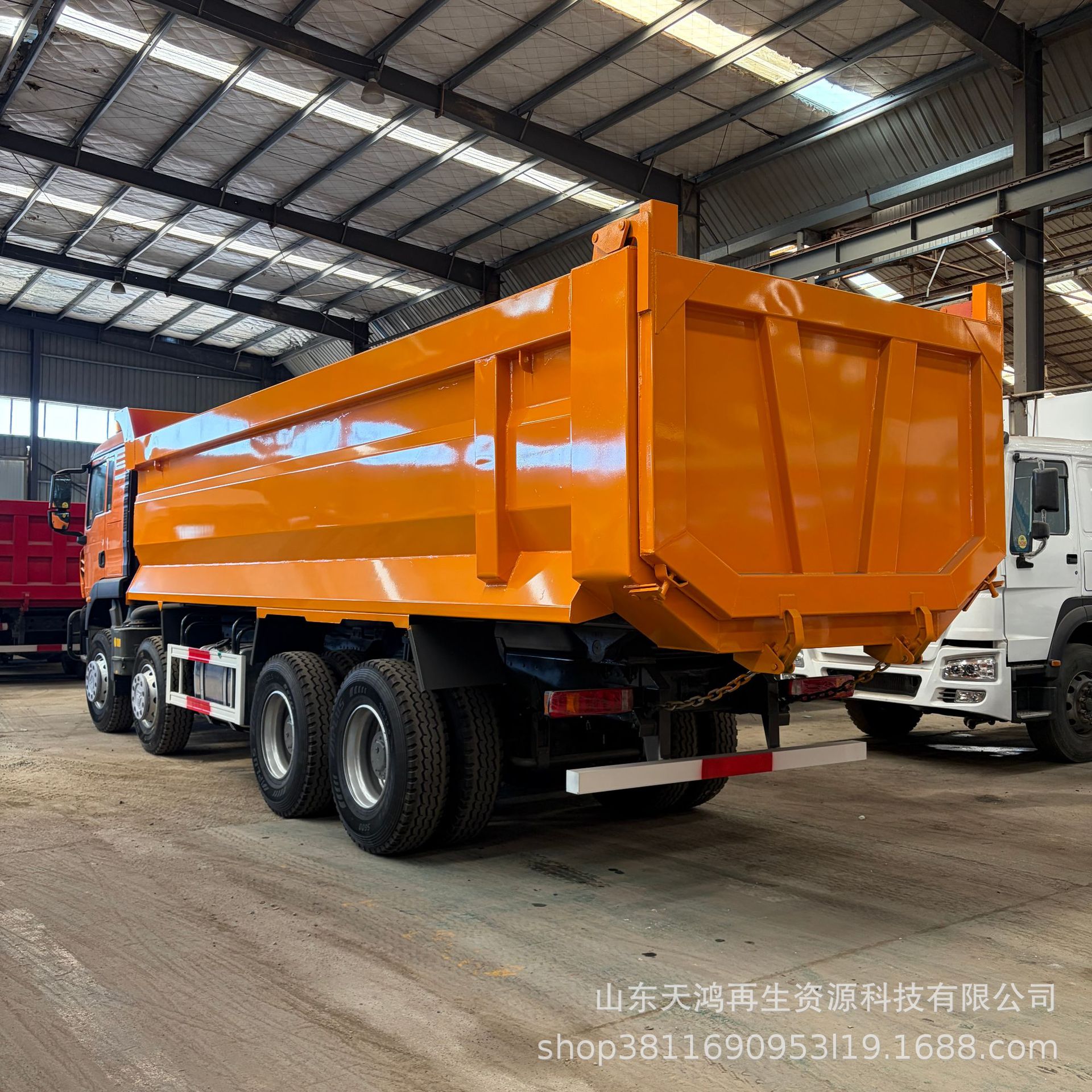 Chinese factory directly sells HOWO TX8x4 dump truck trailers to Africa, offering cross-border sales
