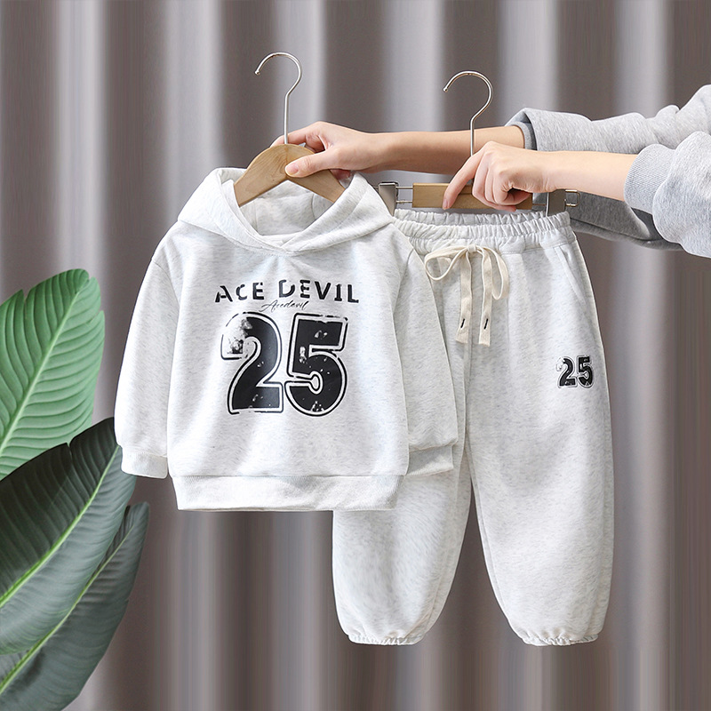 7785 Traje deportivo para niños Primavera y otoño 2025 Nuevo suéter con capucha con estampado de letras para niños Conjunto de dos piezas de primavera