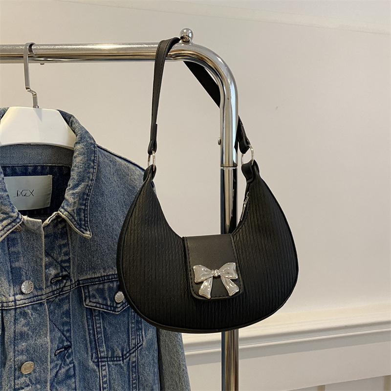 Bolsa debajo de la axila temperamento de alto valor facial bolso de mujer nicho de diseño bolso de hombro de invierno 2024 nuevo temperamento de arco mujer