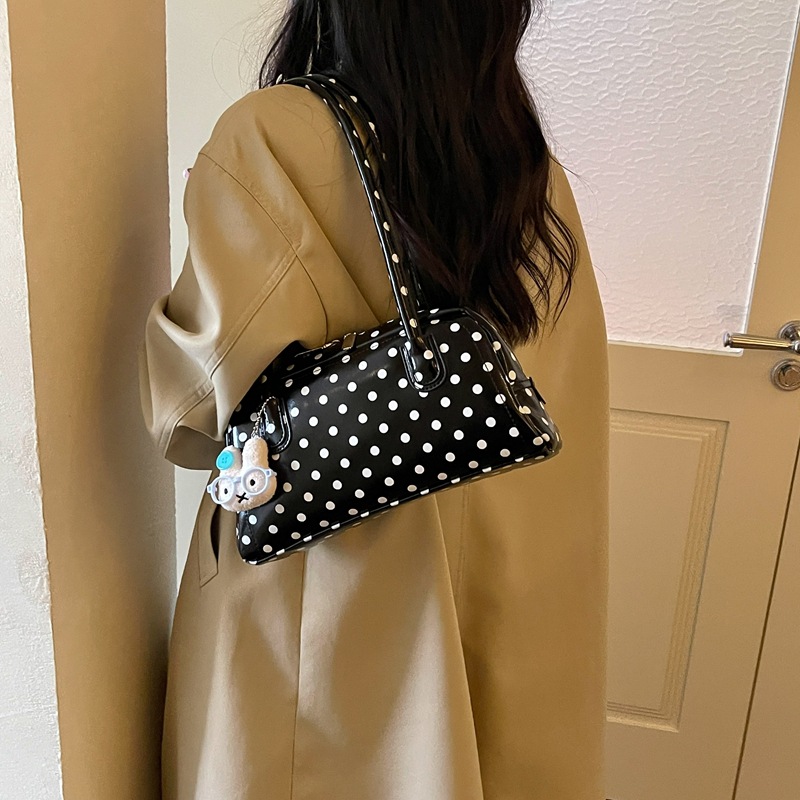 La versión coreana de Xiaozhong Wa punto de bolso de almohada de mano casual 2026 nueva moda versátil bolso de hombro bolso de brazo de alto valor