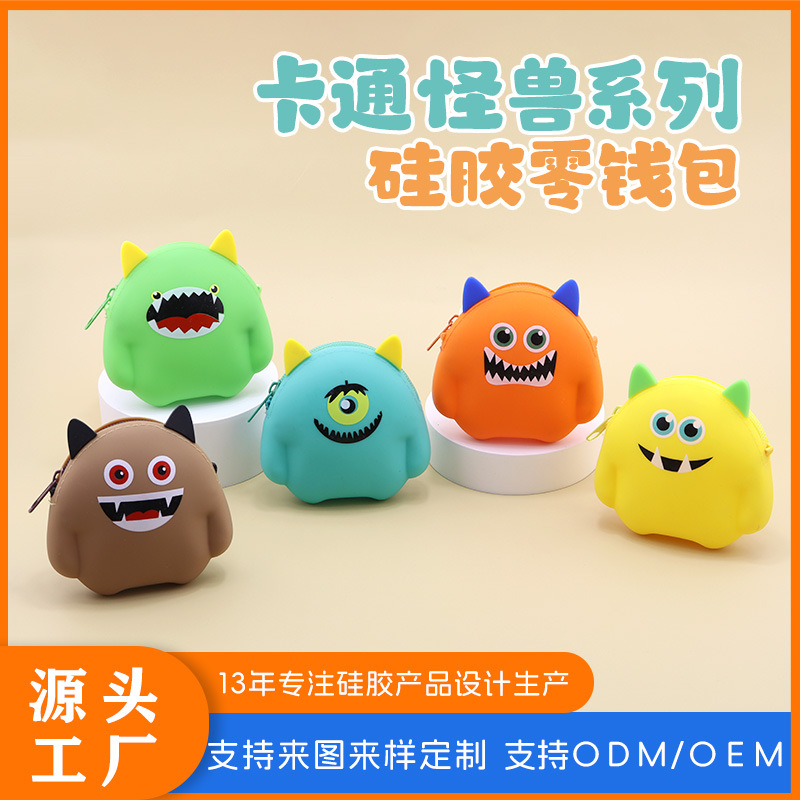 Monstruos de dibujos animados de silicona bolso de cambio de color caramelo cable de datos auriculares bolsa de almacenamiento portátil mini llave bolsa