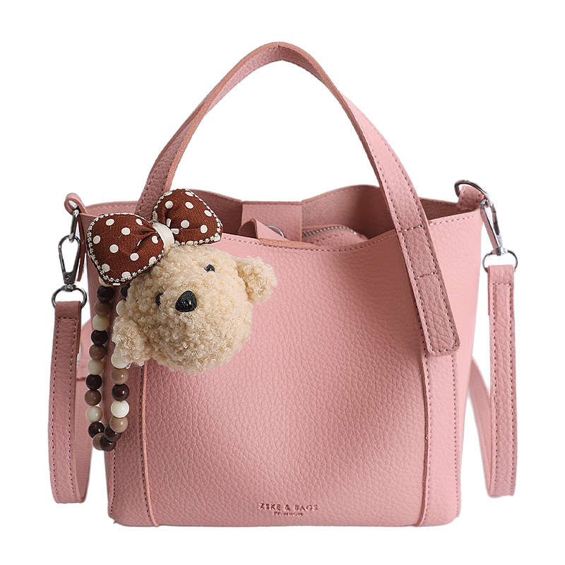 Nicho coreano litchi pattern bolso de cubo de mano mujer comercio exterior nueva moda alta textura ligera lujosa bolsa de mochila