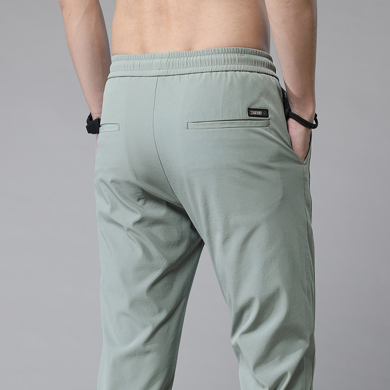 Pantalones casuales de hielo delgados de verano transfronterizos elásticos delgados de hombre 2026 nuevos pantalones deportivos de secado rápido