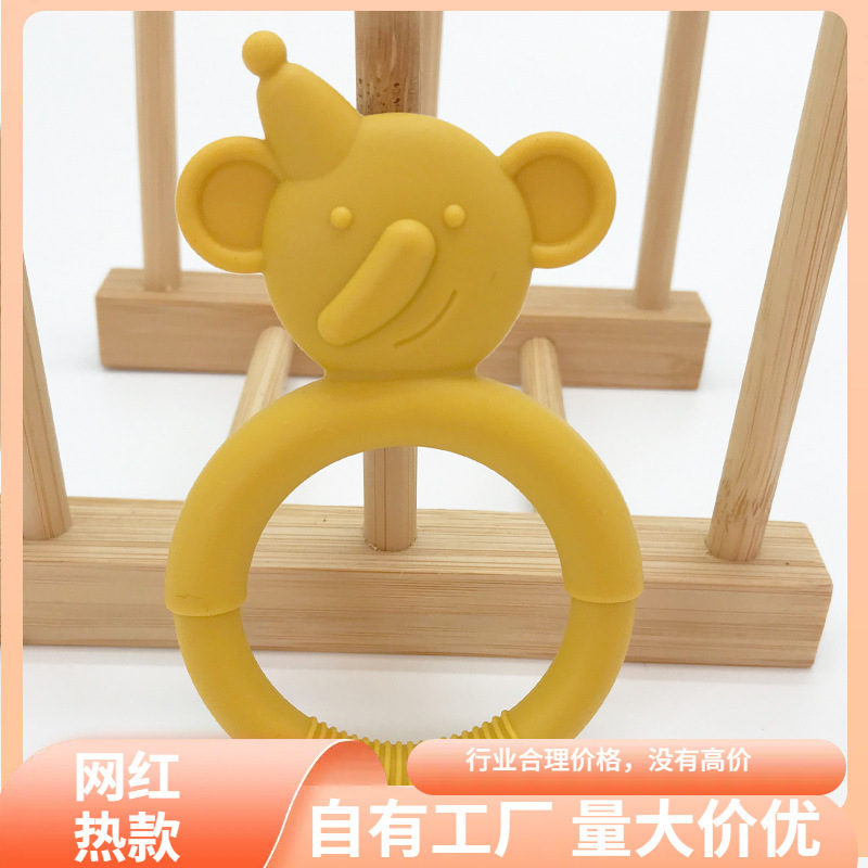 优惠儿童房婴儿牙胶用品宝宝硅胶咬牙胶磨牙棒咬咬乐玩具母婴用品