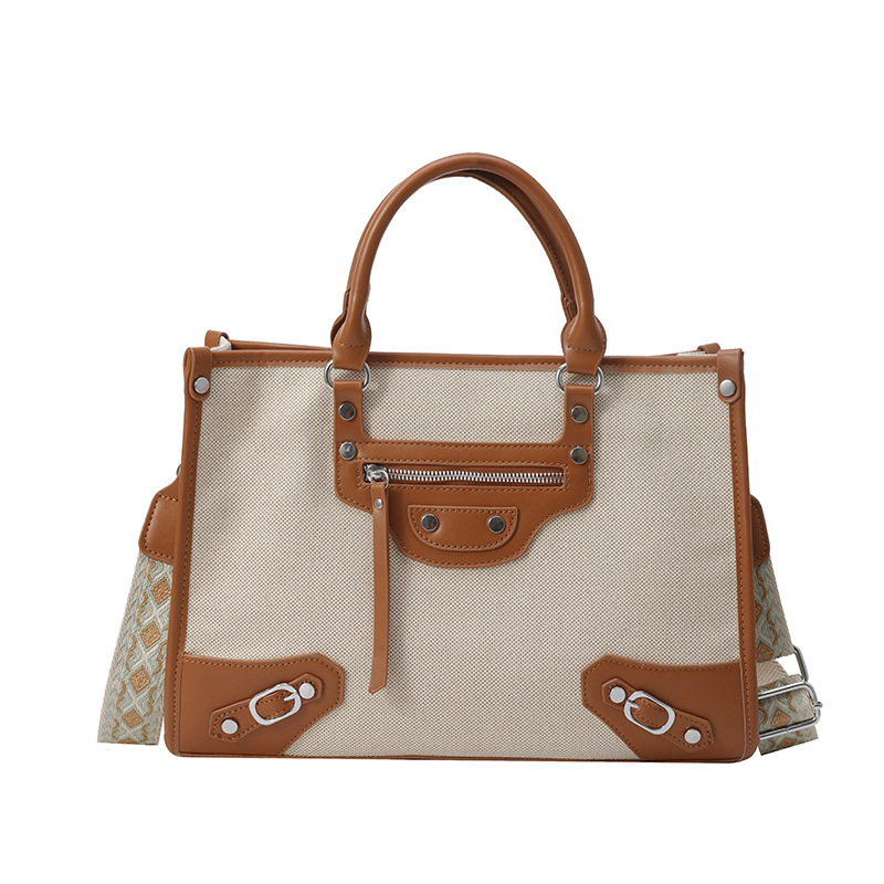 Bolsa de hombro retro remachado lujoso ligero versátil Volkswagen gran capacidad bolso de mano caliente locomotora cool mochila