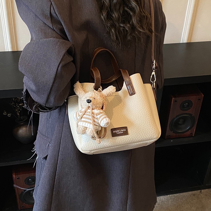 Coreano simple bolso de mano de contraste de color mujer 2026 nueva tendencia de moda de gran capacidad bolso de hombro bolso versátil