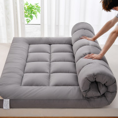 ホテルのマットレスのクッションの薄いタイプの家庭用のマットレスの保護マットの布団の寮のオンドルの上でマットレスの工場の卸売りを敷きます。