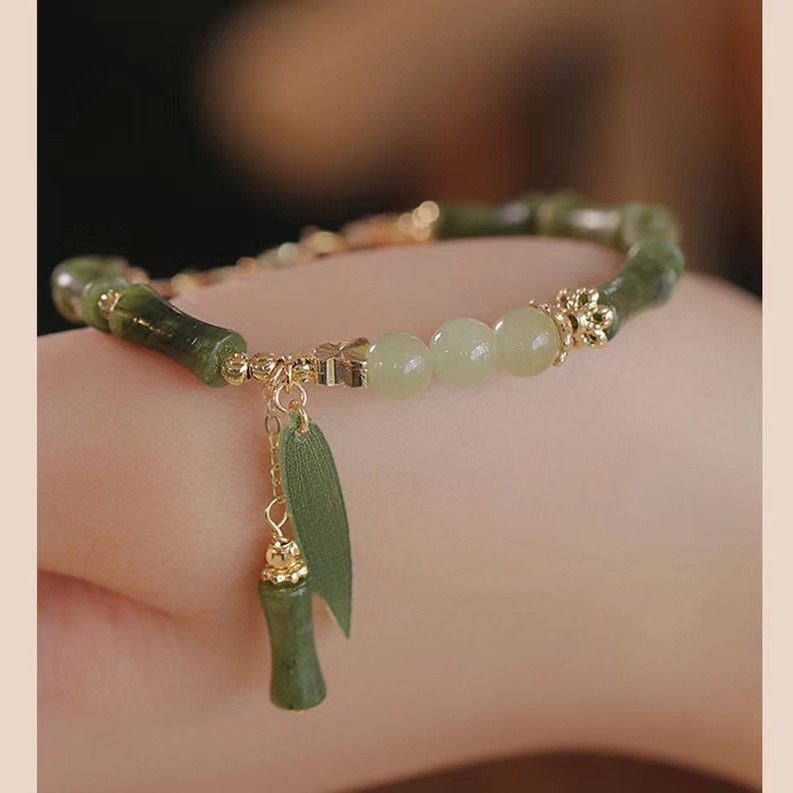 A retro Chinese-style olive jade bamboo joint bracelet for women, with a unique design and simple charm. A new Chinese-style Hetian jade bracelet for women, 253 undefined