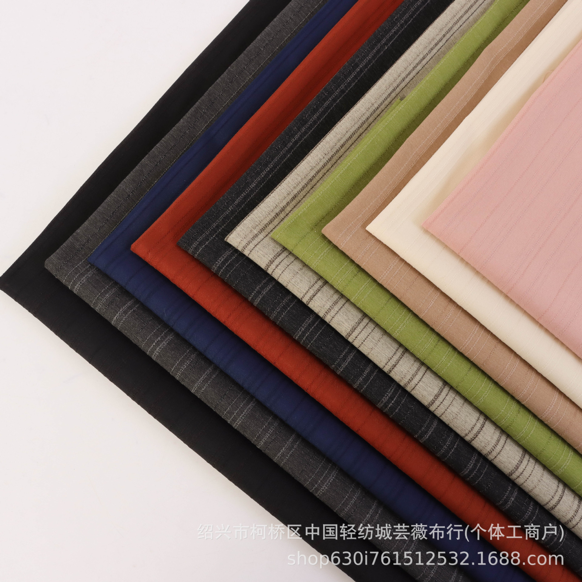 新品现货TR弹力提花条仿麻纹肌理感轻肤英伦风休闲服套装时装面料